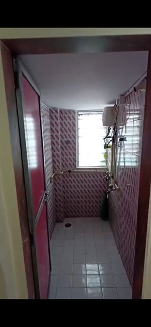 Bathroom in 1 BHK Apartment at Kiran Chandra CHS, Andheri West – for Rent