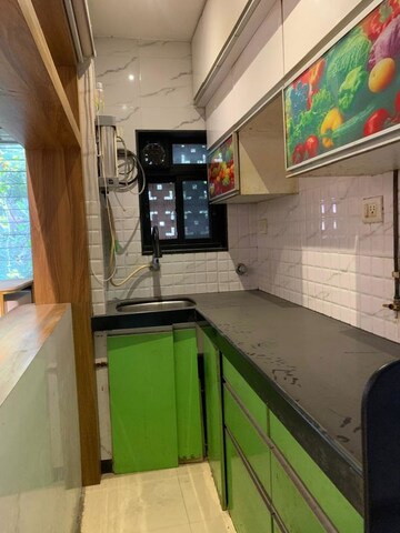Kitchen in 1.5 BHK Apartment at Bhushan Park View CHS, Borivali West – for Rent