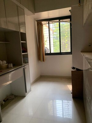 Room in 1.5 BHK Apartment at Bhushan Park View CHS, Borivali West – for Rent