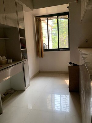 Room in 1.5 BHK Apartment at Bhushan Park View CHS, Borivali West – for Rent