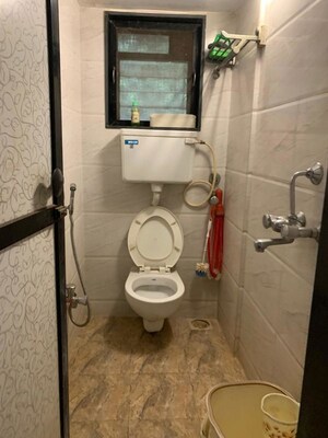 Bathroom in 1.5 BHK Apartment at Bhushan Park View CHS, Borivali West – for Rent