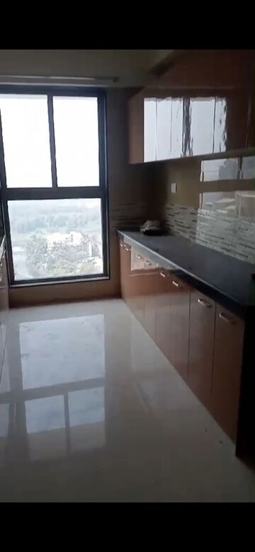 Kitchen in 2 BHK Apartment at Rajesh Raj Infinia, Malad West – for Rent