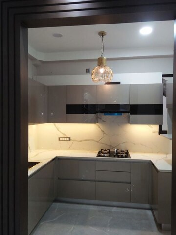 Kitchen in 3 BHK Apartment at Ramprastha Attalika, Ramprastha Greens – for Sale