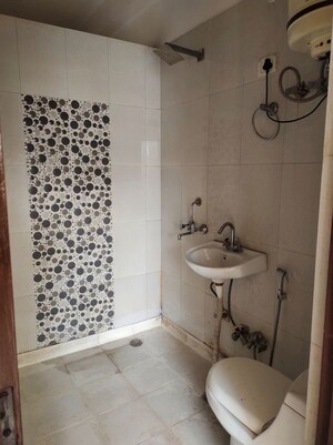 Bathroom in 2 BHK Builder Floor at Chattarpur – for Rent