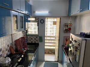 Kitchen in 1 BHK Apartment at Cosmos Enclave, Kasarvadavali – for Rent