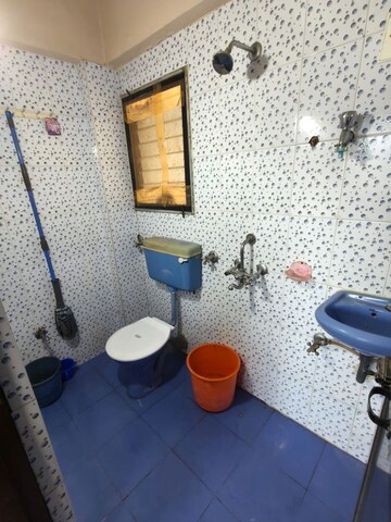 Bathroom in 1 BHK Apartment at Krishna Greenland Park Vastu Federation, Ghodbunder Road – for Rent