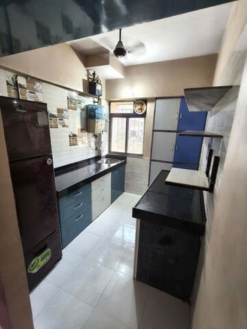 Kitchen in 1 BHK Apartment at Krishna Greenland Park Vastu Federation, Ghodbunder Road – for Rent