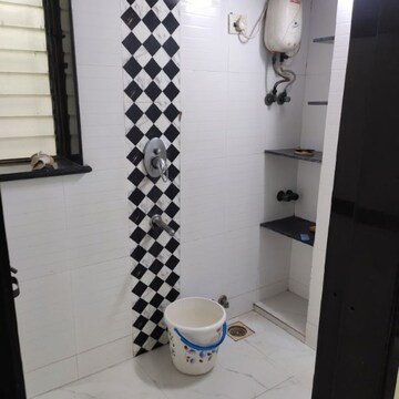 Bathroom in 1 BHK Apartment at Jamuna Darshan CHS, Goregaon West – for Rent