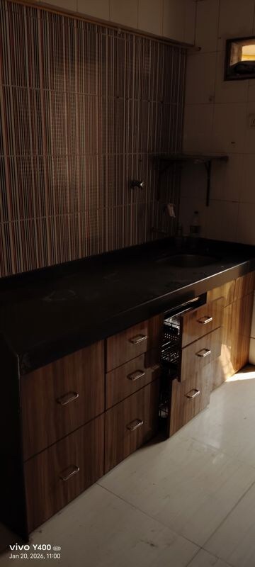 Kitchen in 2 BHK Apartment at Dev Drushti CHS, Bhayandar West – for Rent