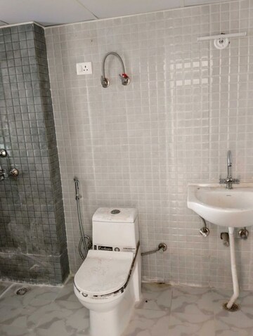 Bathroom in 3 BHK Apartment at Amrapali Heartbeat City, Sector 107 – for Rent