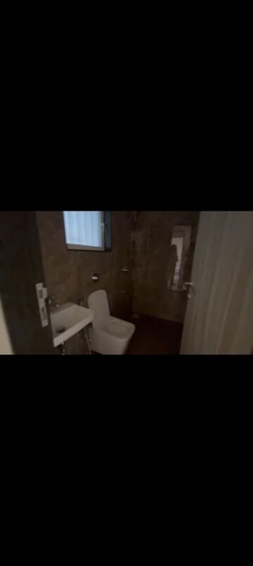 Bedroom in 2 BHK Apartment at Mahaveer Solitaire Edge, Kandivali East – for Rent