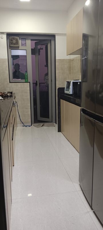 Kitchen in 3 BHK Apartment at Adani Group Western Heights, Andheri West – for Rent