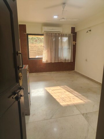Room in 1 BHK Apartment at Manik Prabhu Kripa CHS, Andheri West – for Rent