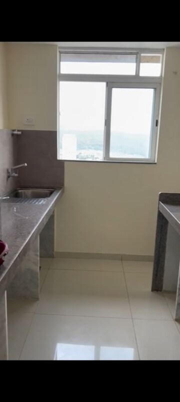 Kitchen in 1 BHK Apartment at Godrej Nest Kandivali, Kandivali East – for Rent