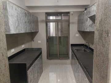 Kitchen in 2 BHK Apartment at Sheth Vasant Oasis, Andheri East – for Rent