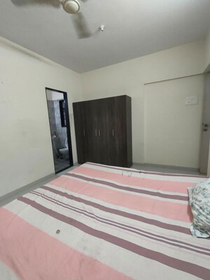 Bedroom in 2 BHK Apartment at Mayfair Housing Hillcrest, Vikhroli West – for Rent