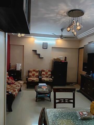 Living Room in 2 BHK Apartment at Meghadoot CHS, Vile Parle East – for Rent