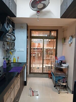 Living Room in 2 BHK Apartment at Meghadoot CHS, Vile Parle East – for Rent