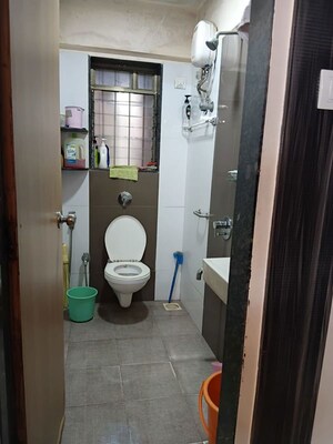 Bathroom in 2 BHK Apartment at Meghadoot CHS, Vile Parle East – for Rent