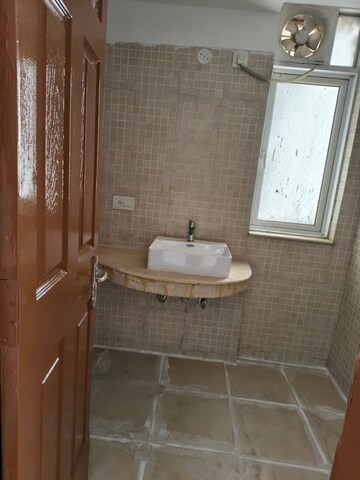 Bathroom in 3 BHK Apartment at Jaypee Greens Pavilion Court, Sector 128 – for Rent