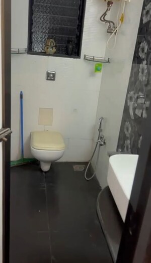 Bathroom in 3 BHK Apartment at Riddhi Garden, Malad East – for Rent