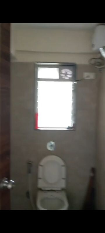 Bathroom in 1 BHK Apartment at Shah Touchwood, Vile Parle East – for Rent