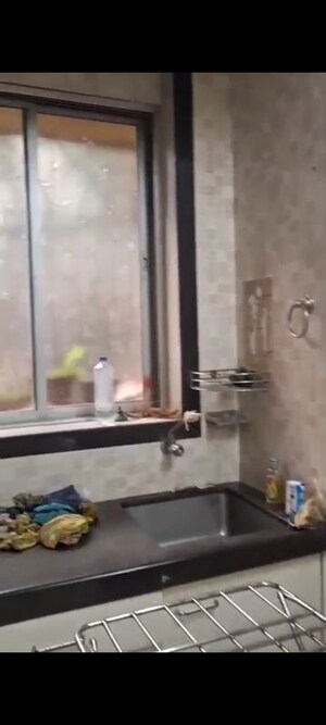 Kitchen in 1 BHK Apartment at Om Vijayshree Apartment, Vile Parle East – for Rent