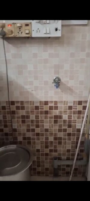 Bathroom in 1 BHK Apartment at Om Vijayshree Apartment, Vile Parle East – for Rent