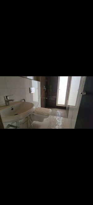 Bathroom in 2 BHK Apartment at RNA NG Eclat, Andheri West – for Sale