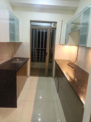 Kitchen in 2 BHK Apartment at Kalpataru Paramount, Kapur Bawdi – for Rent