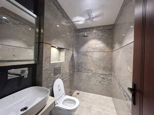 Bathroom in 4 BHK Apartment at Vasant Kunj – for Rent