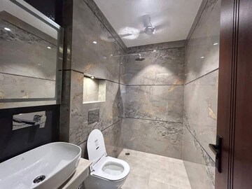Bathroom in 4 BHK Apartment at Vasant Kunj – for Rent