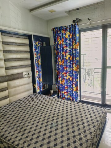Bedroom in 2 BHK Apartment at Akash Arcade CHS, Kalyan West – for Sale