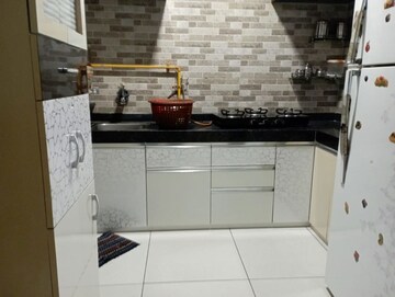 Kitchen in 2 BHK Apartment at Sahaj Solarium, Vasna – for Rent
