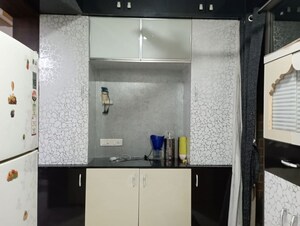 Kitchen in 2 BHK Apartment at Sahaj Solarium, Vasna – for Rent