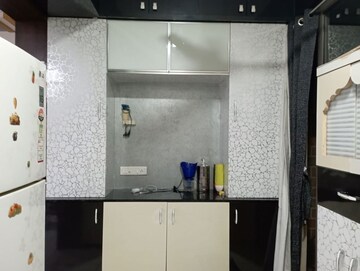 Kitchen in 2 BHK Apartment at Sahaj Solarium, Vasna – for Rent