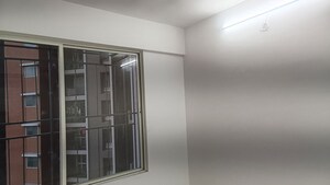 Room in 2 BHK Apartment at Tulip Infinity Planet, Moshi – for Rent