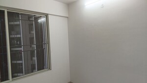 Room in 2 BHK Apartment at Tulip Infinity Planet, Moshi – for Rent