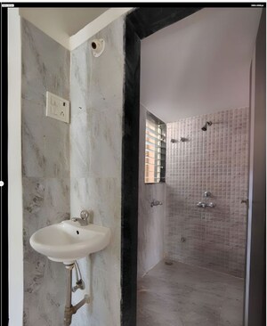 Bathroom in 1 BHK Apartment at Mohan Palms, Katrap – for Sale