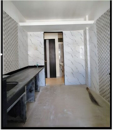 Kitchen in 1 BHK Apartment at Mohan Palms, Katrap – for Sale