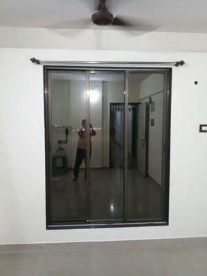 Living Room in 1 BHK Apartment at Beauty Landmark, Bhandup West – for Rent