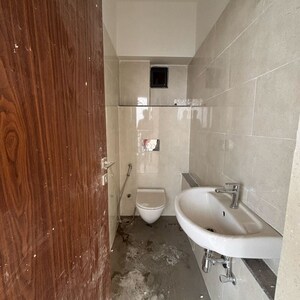 Bathroom in 2 BHK Apartment at Dynamix Divum, Riddhi Gardens – for Rent