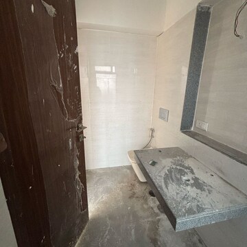 Bathroom in 2 BHK Apartment at Dynamix Divum, Riddhi Gardens – for Rent