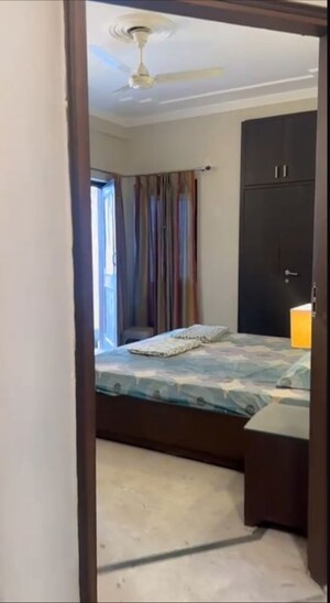 Bedroom in 2 BHK Builder Floor at Nehru Enclave – for Sale