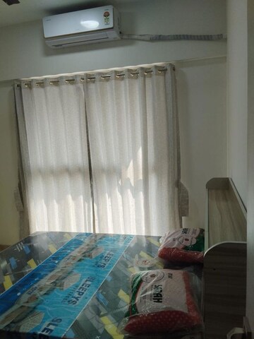 Bedroom in 2 BHK Apartment at Chandak Cornerstone, Worli – for Rent