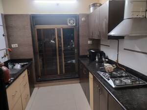Kitchen in 3 BHK Apartment at Platinum Sai Pearl, Karanjade – for Rent