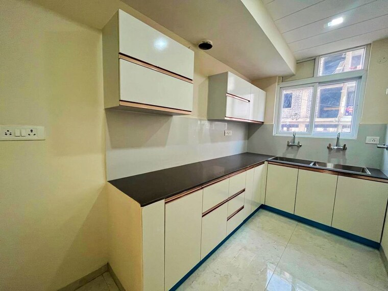 Kitchen, aura-homes 3 Bedroom 2280 Sq.Ft. Apartment In Patiala Road Zirakpur 9955633