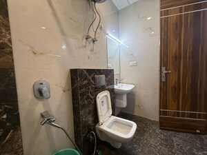 Bathroom in 1.5 BHK Builder Floor at Sector 55 – for Rent