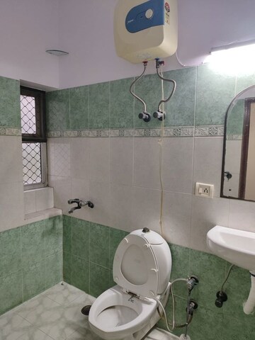 Bathroom in 1 RK Apartment at Damodar Complex, Sector 37 – for Rent