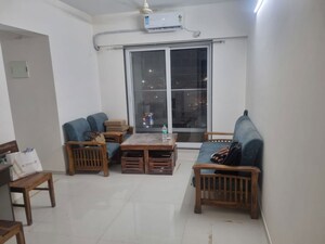 Living Room in 1 BHK Apartment at Ashar Axis, Majiwada – for Rent